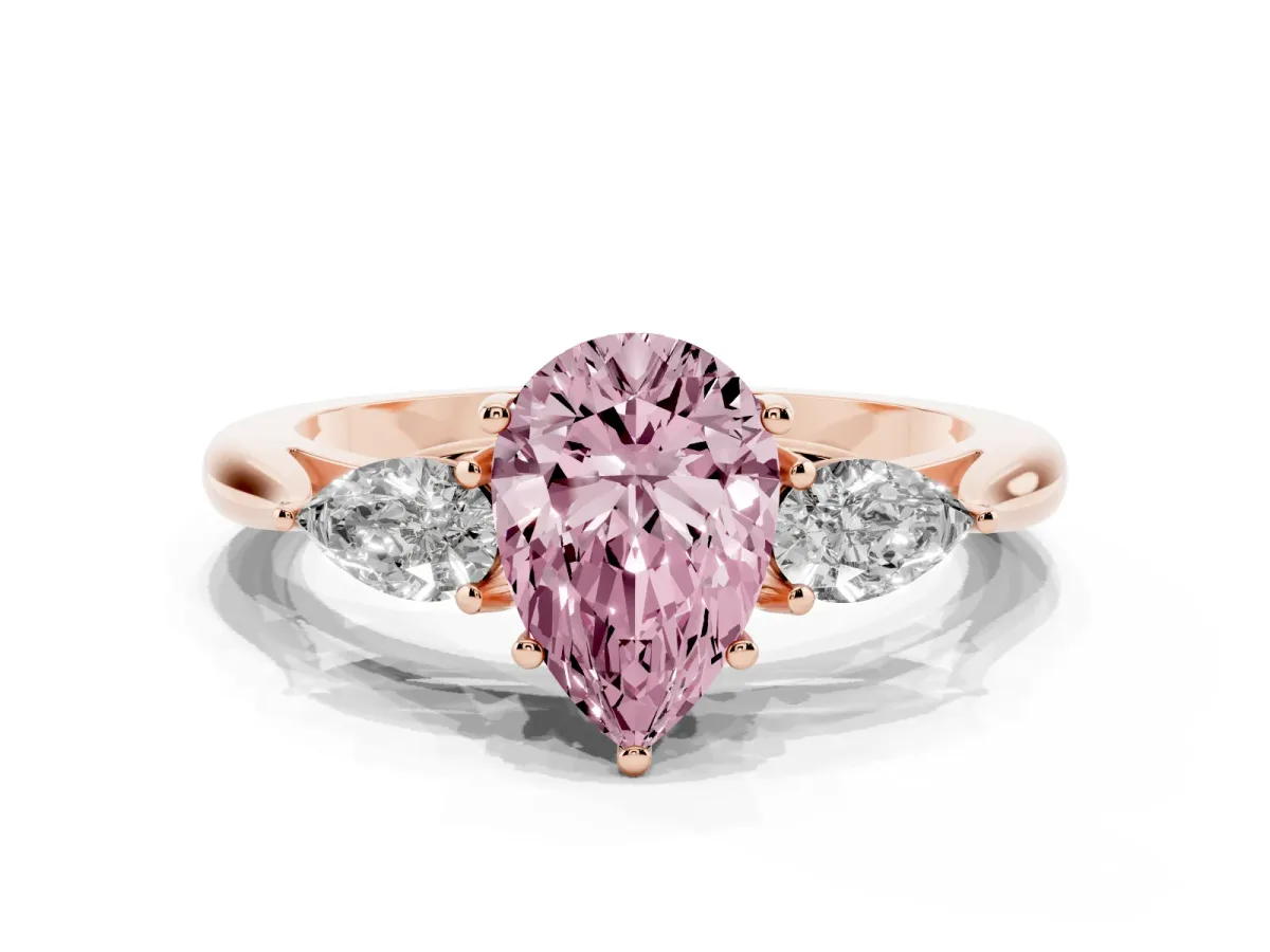 Fancy Pink Three-Stone Pear Cut Diamond Ring with Pear Side Stones in Four-Prong Setting Rose gold