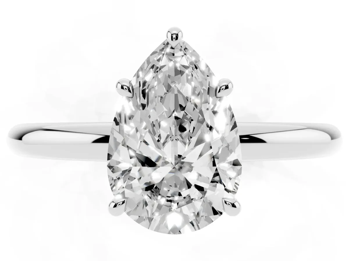 Pear Cut Diamond Solitaire Ring with Thin Band and Four-Prong Setting Silver
