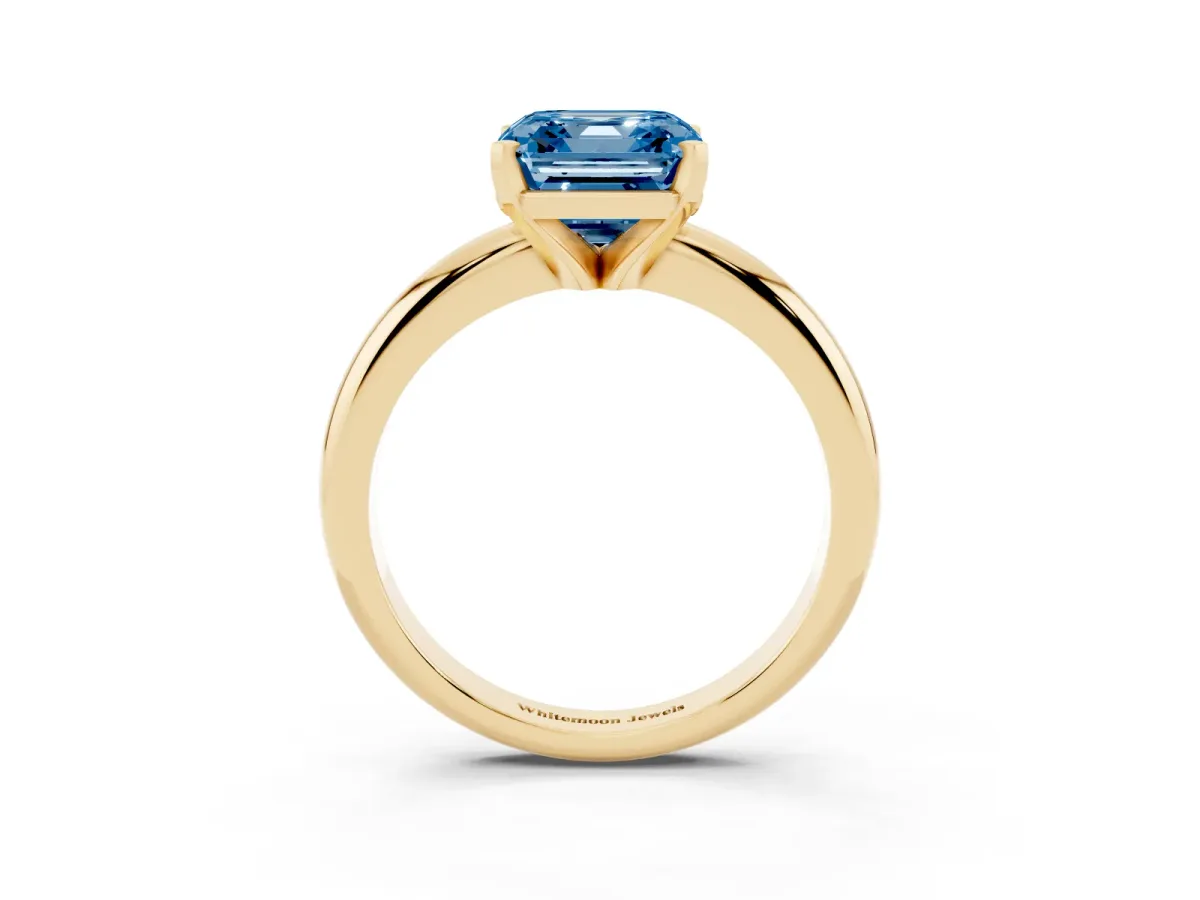 Fancy Blue Asscher Cut Diamond Solitaire Engagement Ring with Round Band and Four-Prong Setting Yellow gold