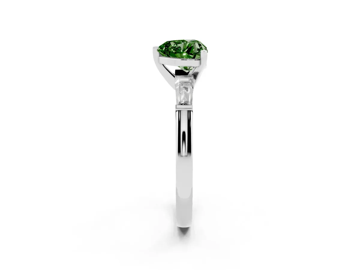 Fancy Green Heart Cut Solitaire with Tapered Baguette Side Stones on a Classic Band with Four-Prong Setting Silver