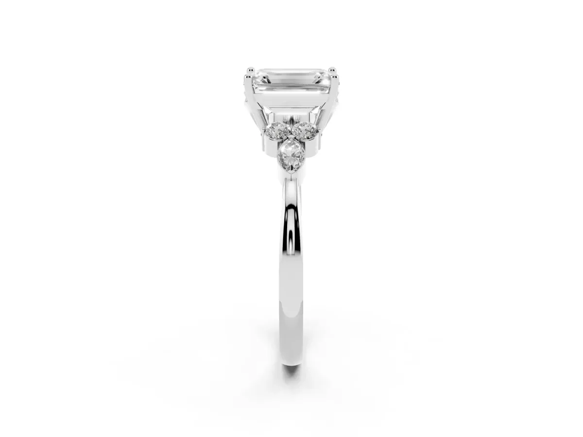 Emerald Cut Brilliant Diamond Solitaire Ring with Pear Side Stones and Four-Prong Setting Silver