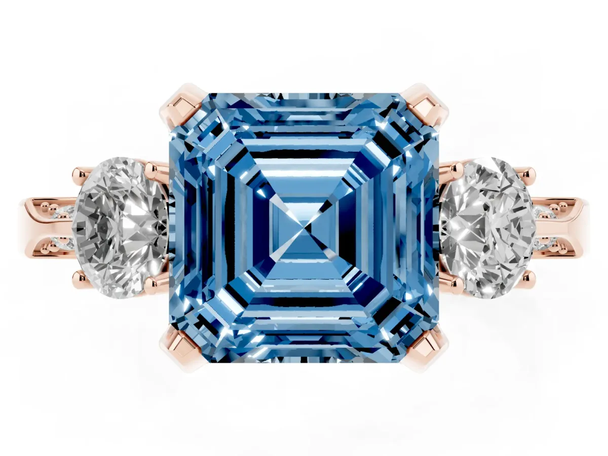 Fancy Blue Asscher Cut Brilliant Three-Stone Diamond Ring with Pavé Band and Four-Prong Setting Rose gold