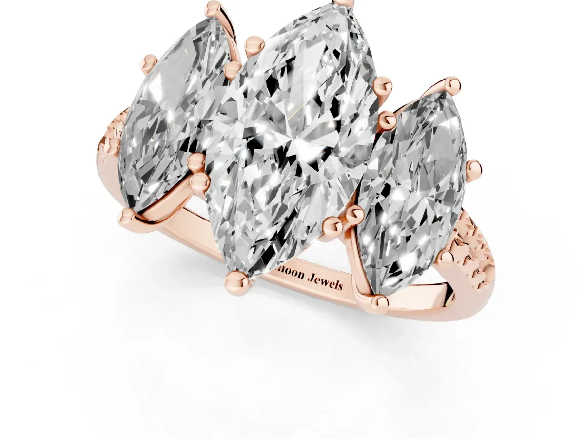 Three-Stone Marquise Cut Diamond Ring with Round Pavé Band and Prong Setting Rose gold