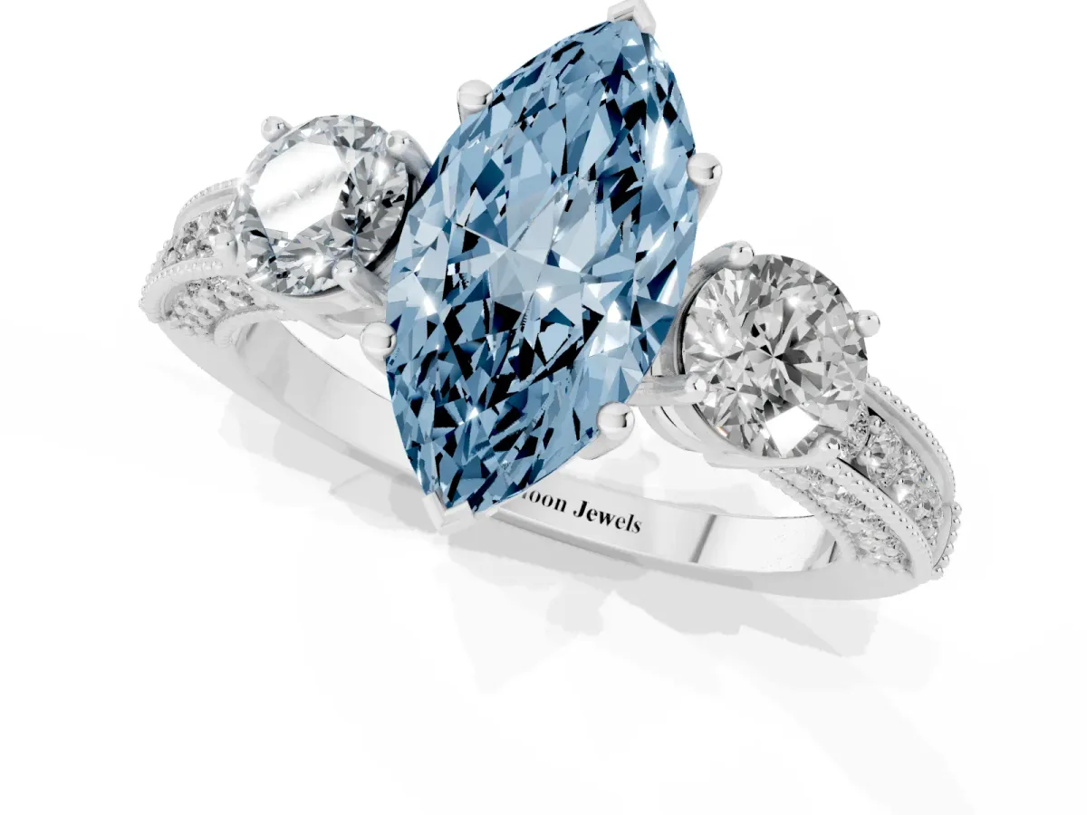 Fancy Blue Marquise Cut Three-Stone Diamond Ring with Pavé Band and Four-Prong Setting Silver
