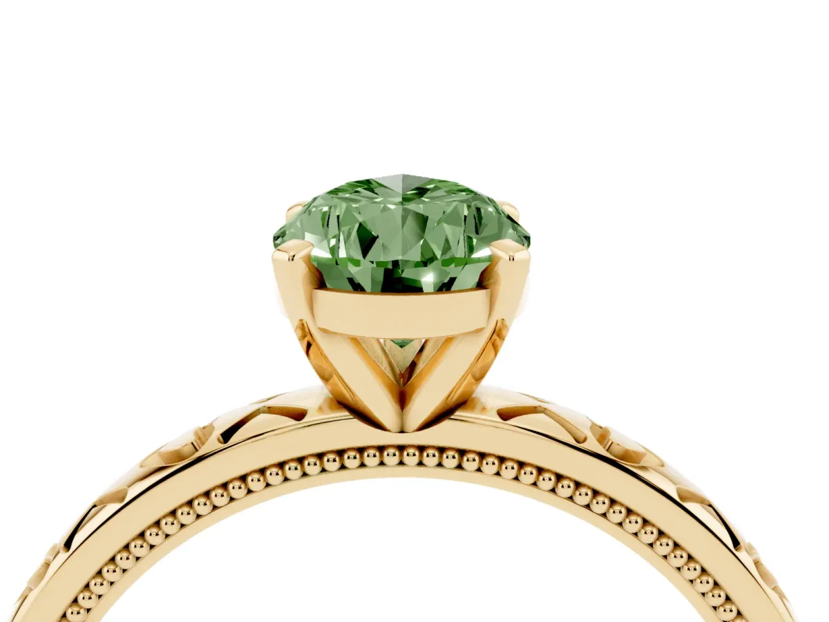 Fancy Green Pear Cut Solitaire Diamond Engagement Ring with XO Engraved Band and Four-Prong Setting Yellow gold