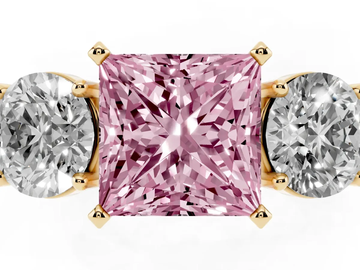 Fancy Pink Three-Stone Princess Cut Diamond Ring with Round Side Stones, Classic Band, and Four-Prong Setting Yellow gold