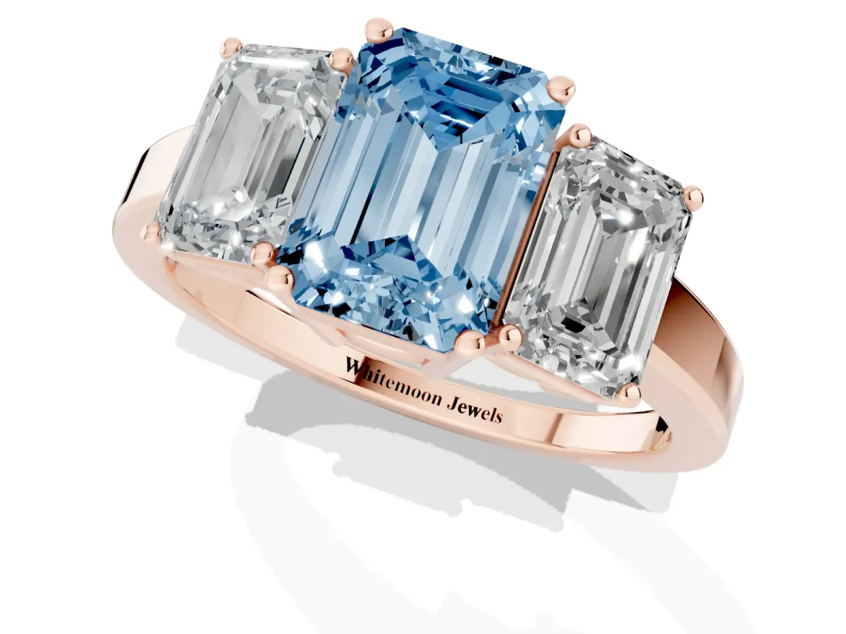Fancy Blue Three-Stone Emerald Cut Cut Diamond Engagement Ring with Flat Band and Four-Prong Setting Rose gold