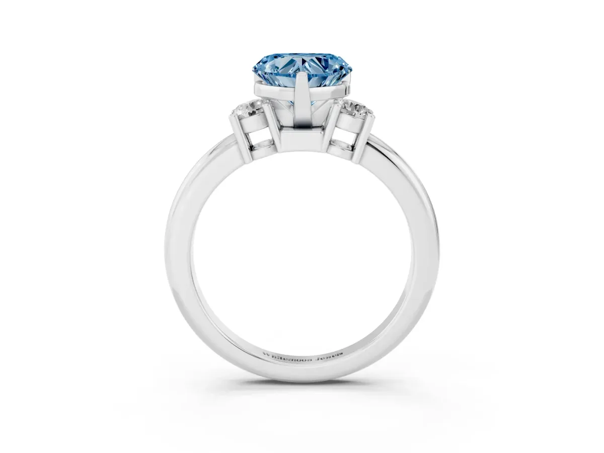 Fancy Blue Three-Stone Heart Cut Cut Diamond Solitaire with Prong Setting and Classic Band Silver