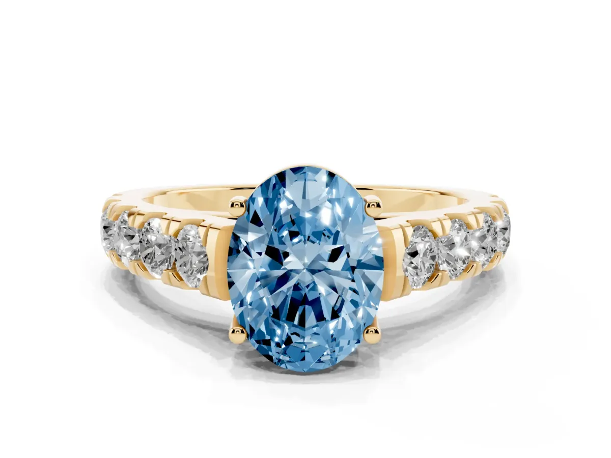 Fancy Blue Oval Cut Cut Diamond Solitaire Ring with Micro Pave Band and Prong Setting Yellow gold