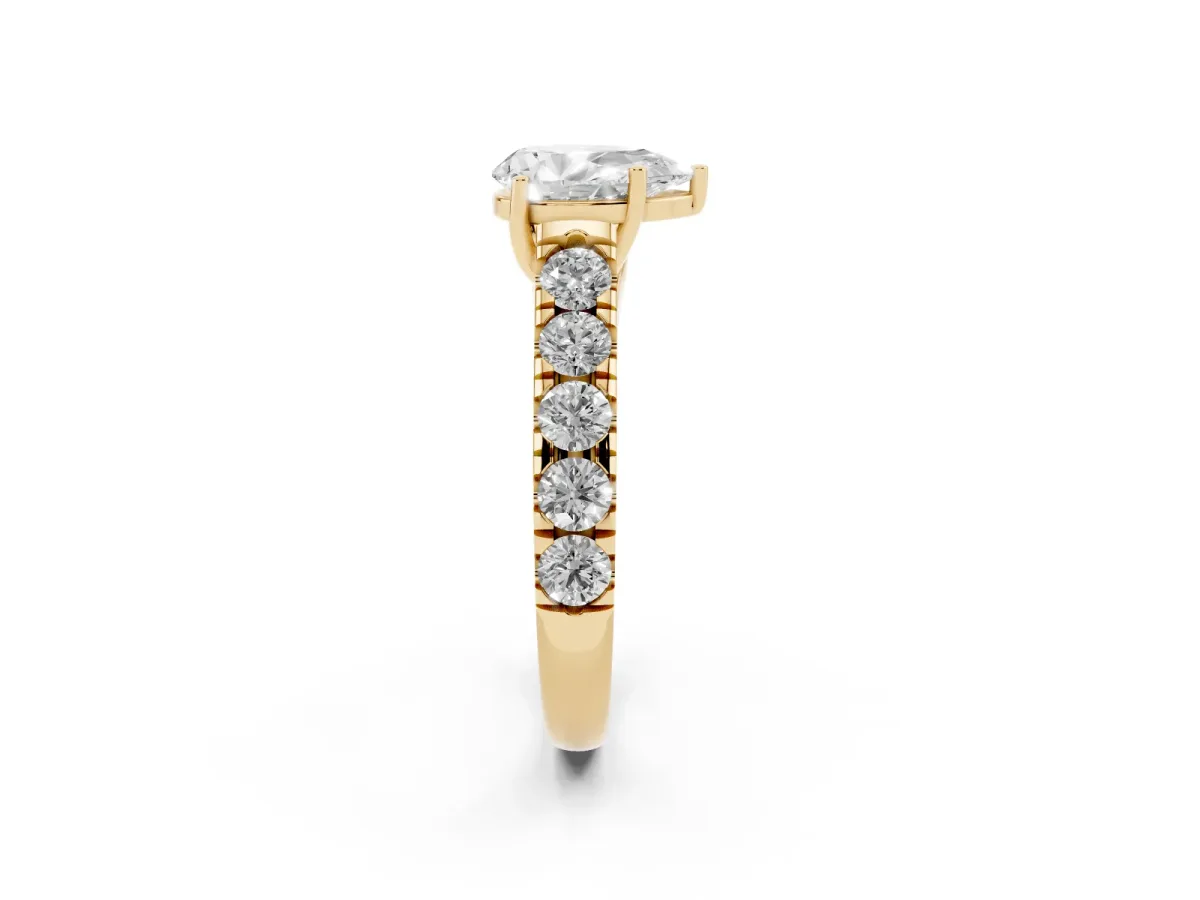 Pear Cut Cut Diamond Solitaire Ring with Micro Pave Band and Prong Setting Yellow gold