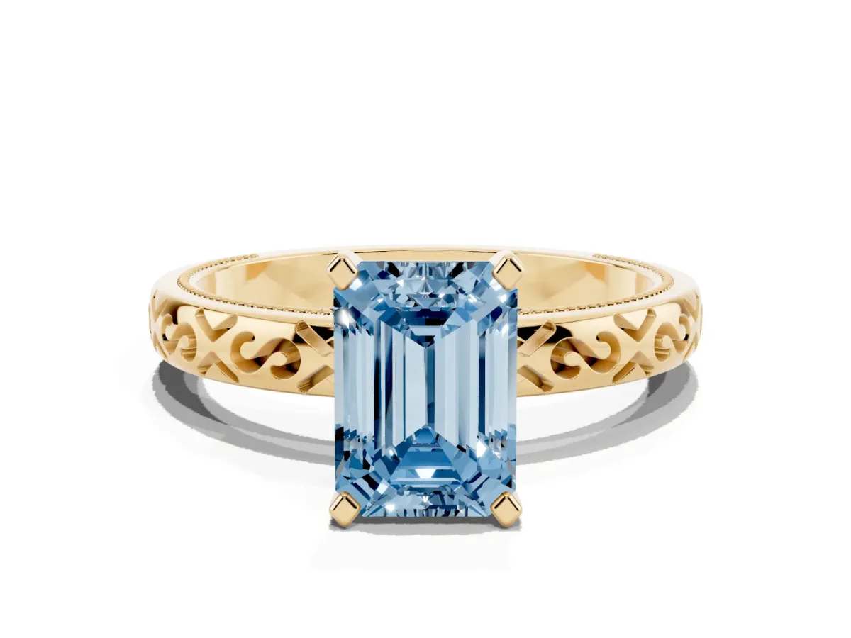 Fancy Blue Emerald Cut Solitaire Engagement Ring with Scrollwork Band and Four-Prong Setting Yellow gold
