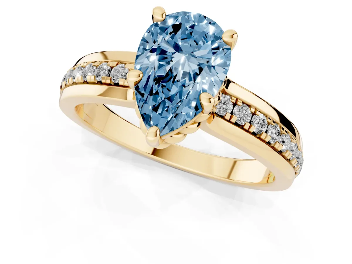 Fancy Blue Pear Cut Solitaire Diamond Ring with Channel Set Band and Six-Prong Setting Yellow gold