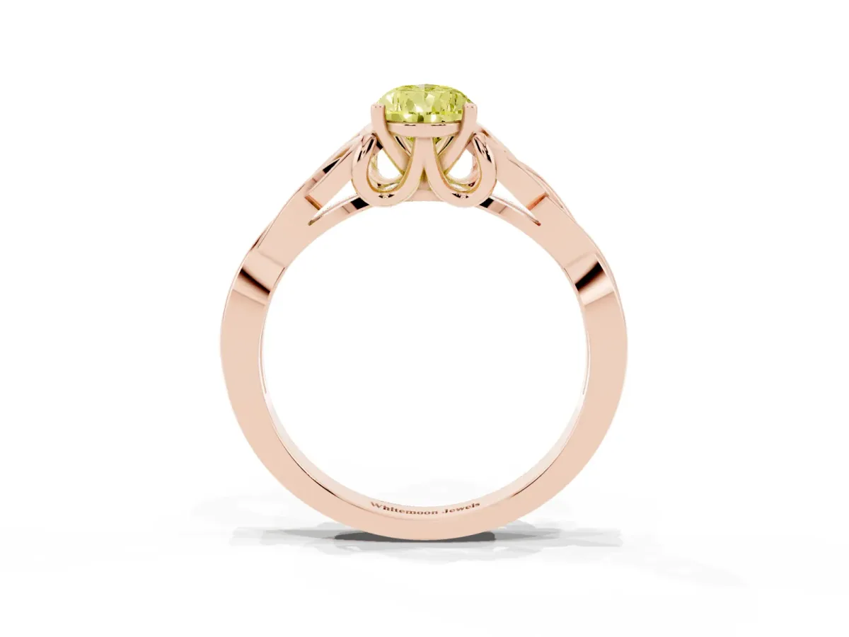 Fancy Yellow Pear Cut Diamond Solitaire Engagement Ring with Celtic Knot Band and Four-Prong Setting Rose gold