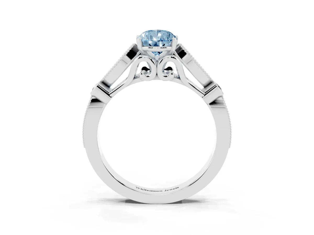 Fancy Blue Pear Cut Cut Diamond with Milgrain Marquise and Bezel Accents on a Solitaire Band with Prong Setting Platinum