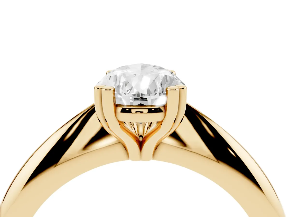 Pear Cut Cut Solitaire Engagement Ring with Tapered Band and Four-Prong Setting Yellow gold