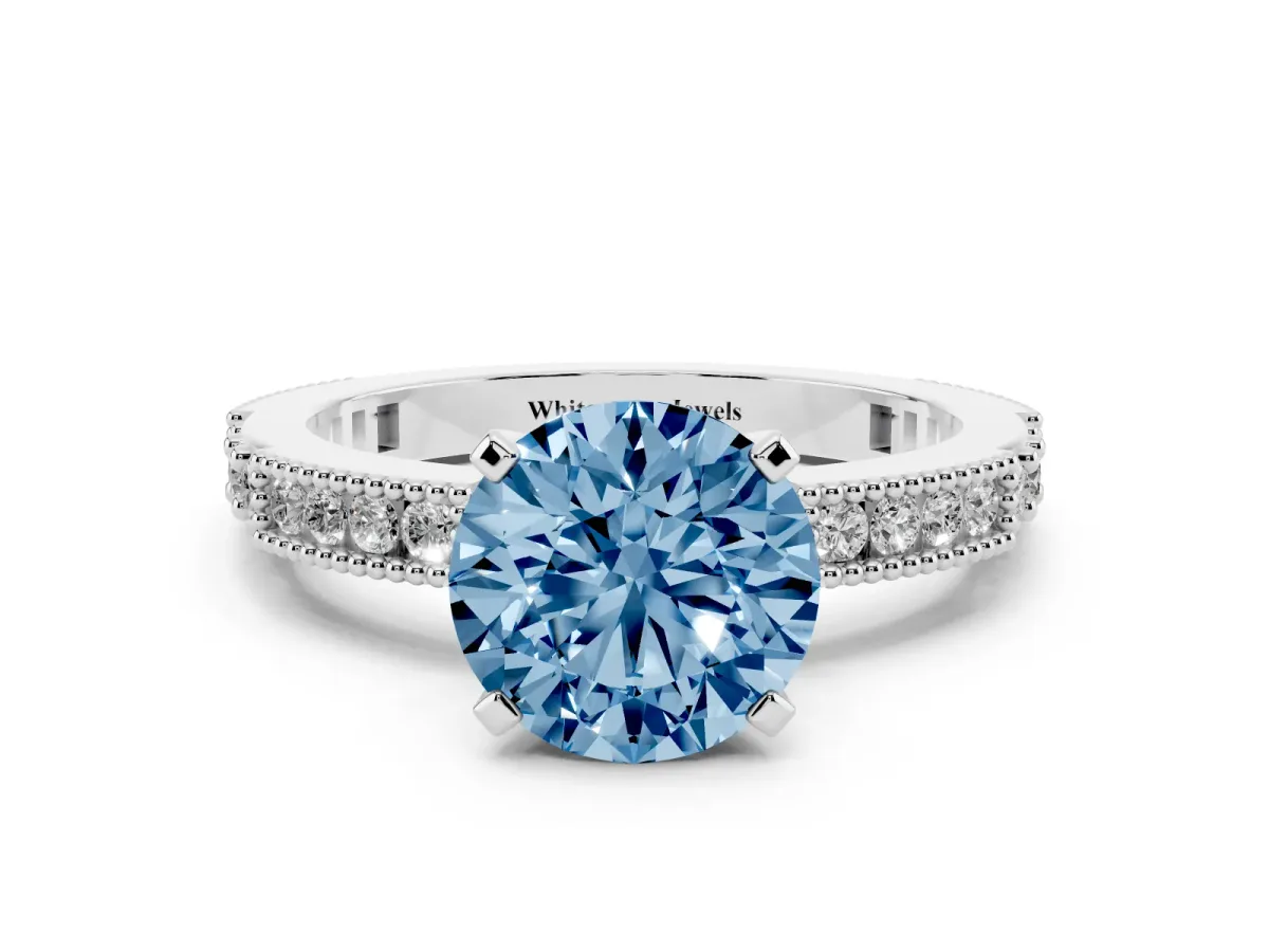 Fancy Blue Round Cut Solitaire with Pavé Band and Four-Prong Setting Platinum