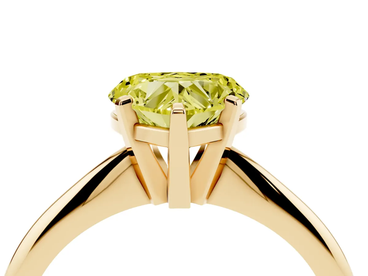Fancy Yellow Heart Cut Cut Solitaire Ring with Four-Prong Setting on a Classic Band Yellow gold