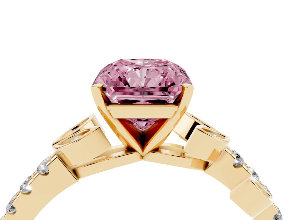 Fancy Pink Radiant Cut Solitaire Leaf-Inspired Diamond Ring with Pavé Band and Four-Prong Setting Yellow gold