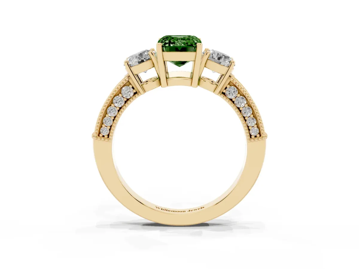 Fancy Green Emerald Cut Three-Stone Diamond Ring with Pavé Band and Four-Prong Setting Yellow gold