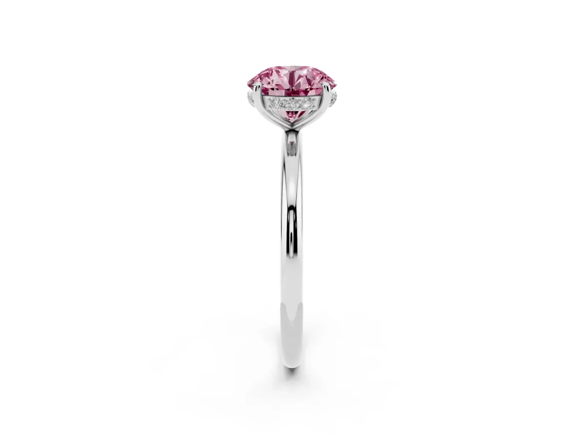 Fancy Pink Round Cut Solitaire Diamond Ring with a Classic Band and Four-Prong Setting Silver