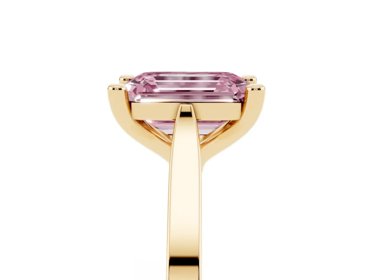 Fancy Pink Emerald Cut Solitaire Diamond Ring with Four-Prong Setting and Tapered Band Yellow gold