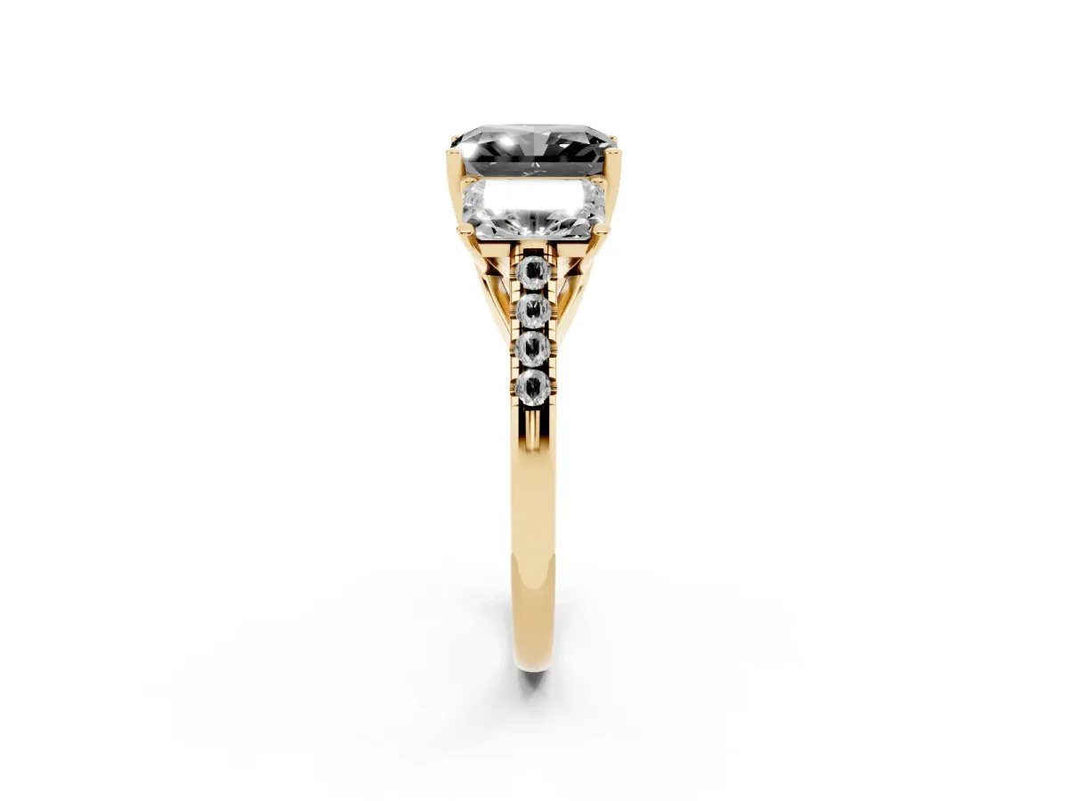 Fancy Black Three-Stone Radiant Cut Diamond Ring with Round Pavé Band and Prong Setting Yellow gold