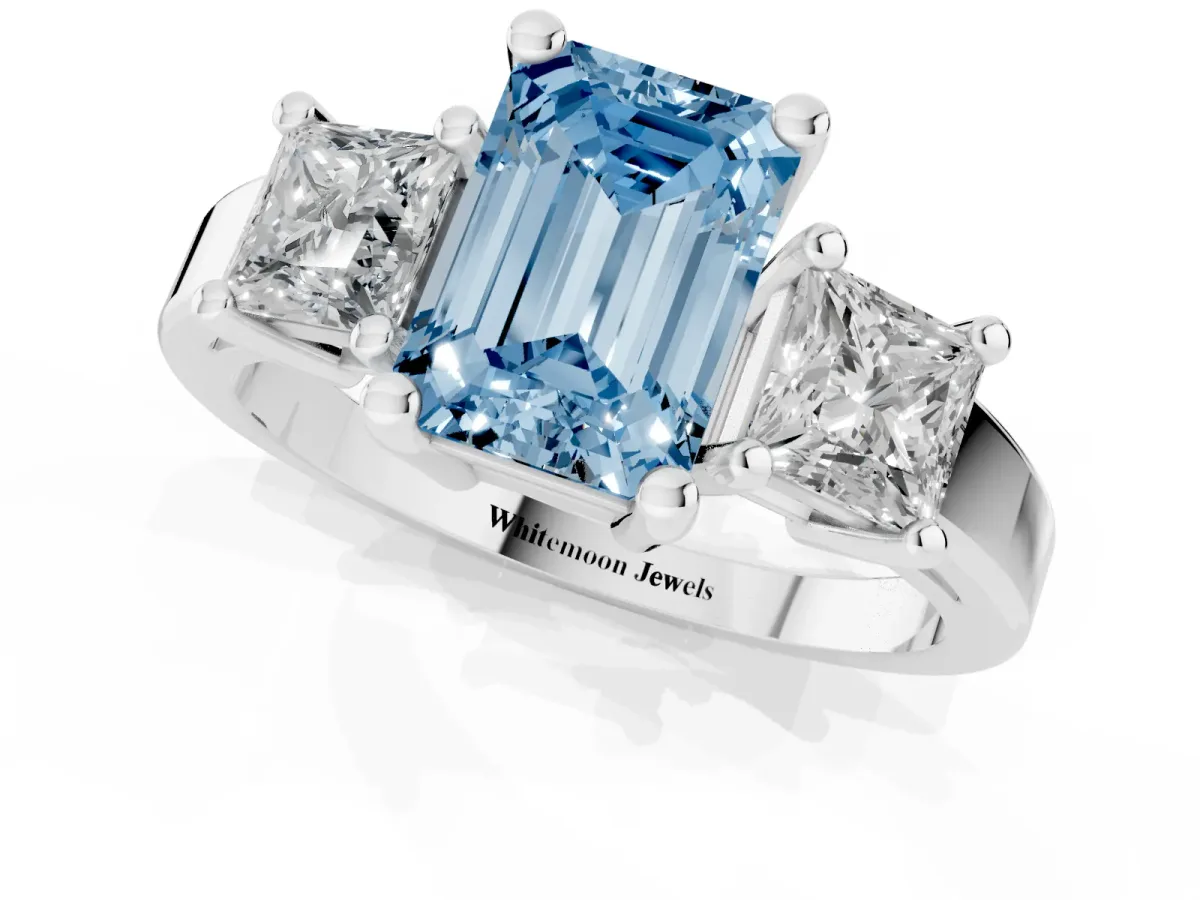 Fancy Blue Three-Stone Emerald Cut Cut Solitaire Ring with Prong Setting Silver