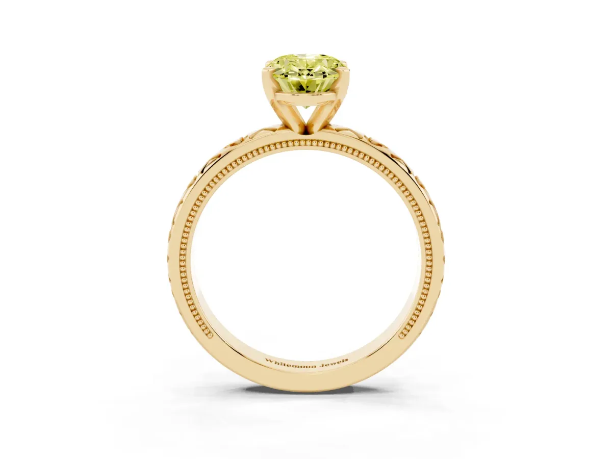 Fancy Yellow Oval Cut Solitaire Diamond Engagement Ring with XO Engraved Band and Four-Prong Setting Yellow gold