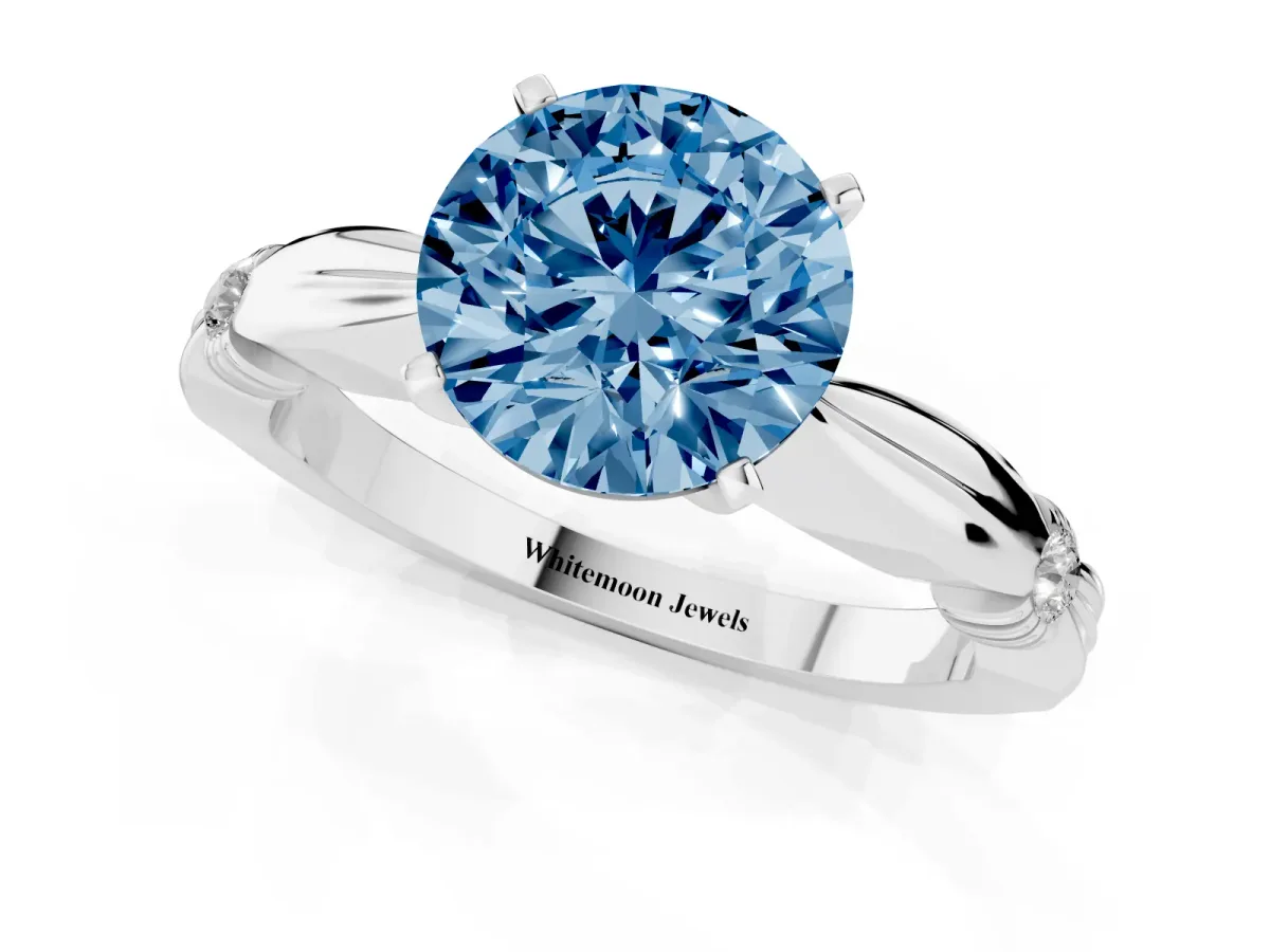 Fancy Blue Round Cut Solitaire Diamond Twisted Band with Four-Prong Setting Platinum