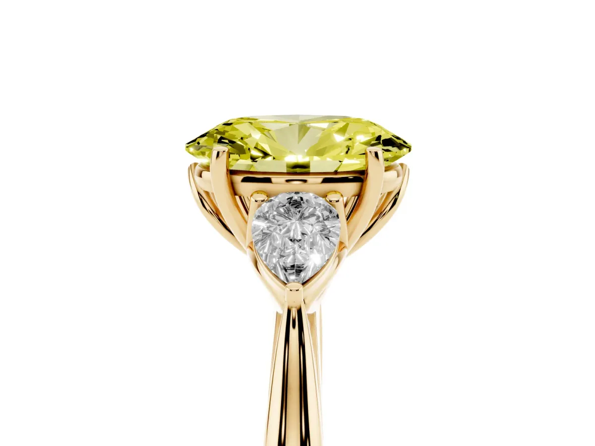 Fancy Yellow Three-Stone Oval Cut Brilliant Diamond Solitaire Ring with Tapered Band and Four-Prong Setting Yellow gold