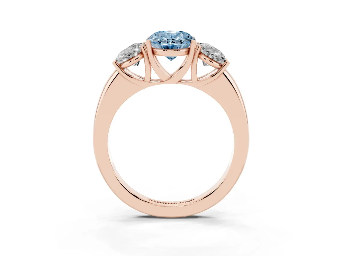 Fancy Blue Oval Cut Diamond Three-Stone Ring with Four-Prong Setting and Classic Band Rose gold
