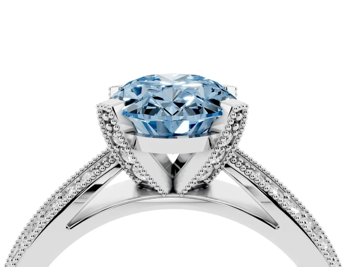 Fancy Blue Oval Cut Diamond Solitaire Ring with Milgrain Round Pavé Band and Prong Setting Silver