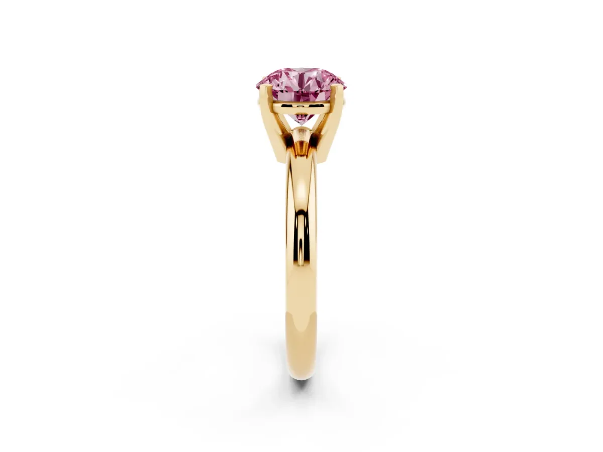 Fancy Pink Round Cut Diamond Solitaire Engagement Ring with Round Band and Four-Prong Setting Yellow gold