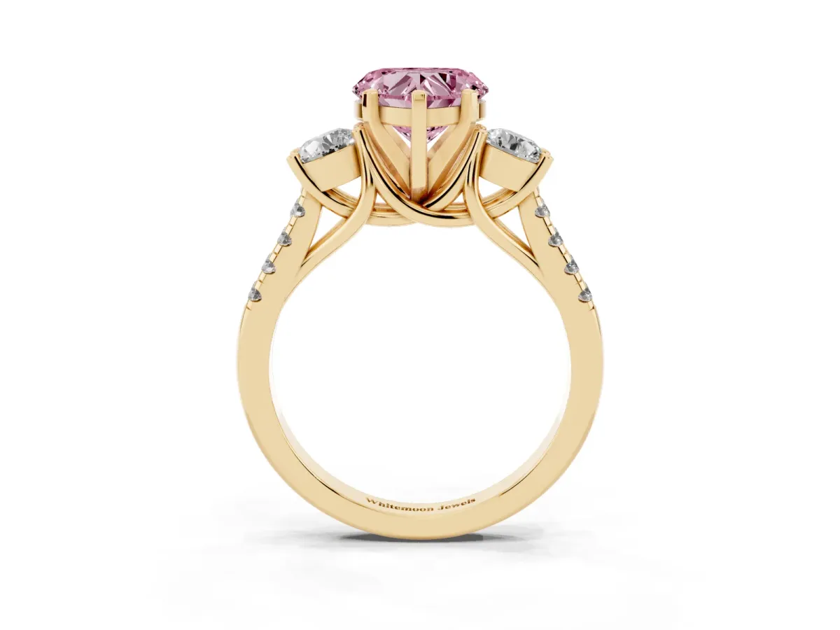 Fancy Pink Three-Stone Heart Cut Diamond Pavé Band with Four-Prong Setting Yellow gold