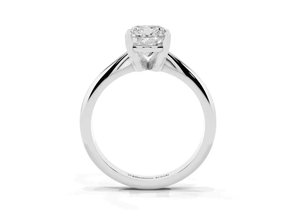 Cushion Cut Cut Solitaire Ring with Four-Prong Setting on a Classic Band Silver
