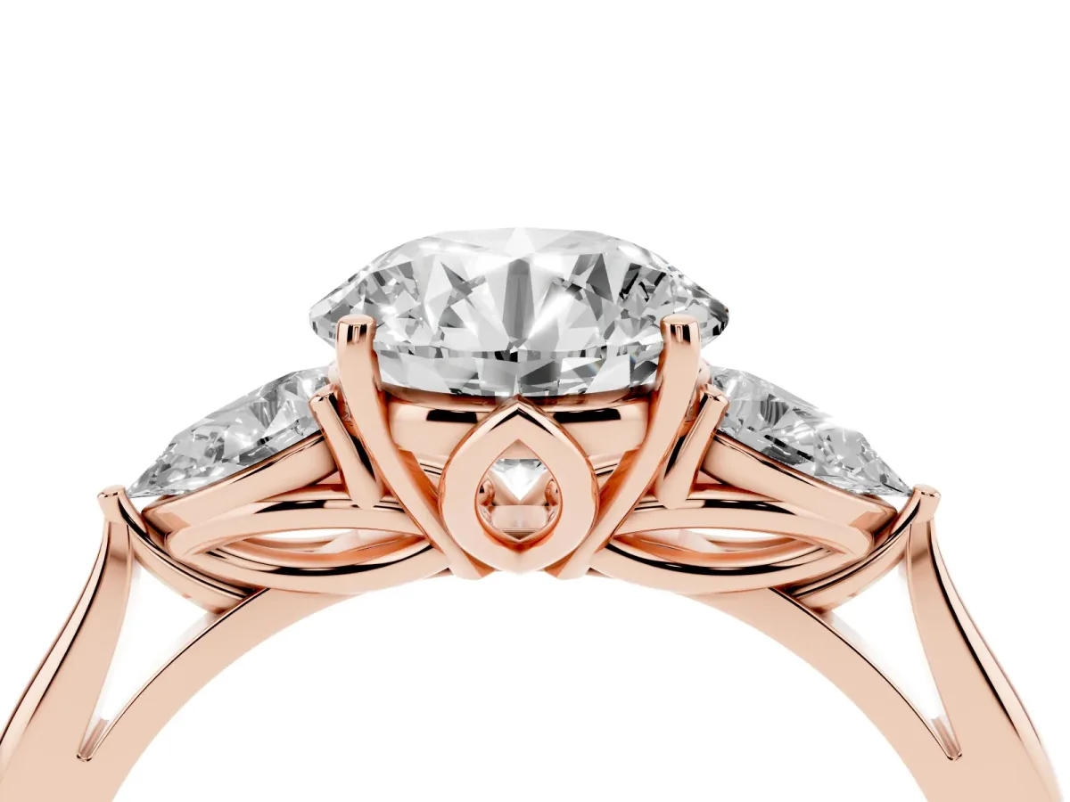 Round Cut Diamond Three-Stone Ring with Pear Side Stones and Prong Setting Rose gold