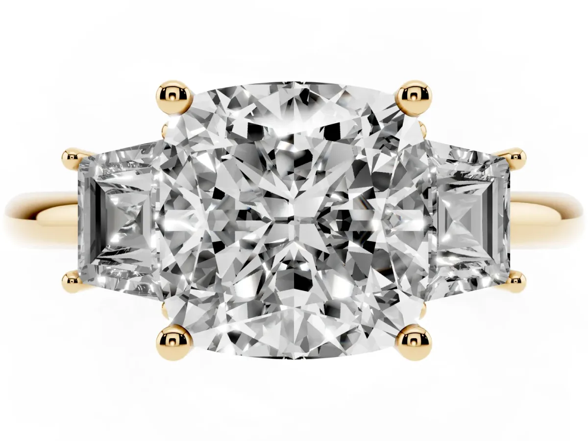 Cushion Cut Diamond Three-Stone Ring with Trapezoid Side Stones and Prong Setting Yellow gold