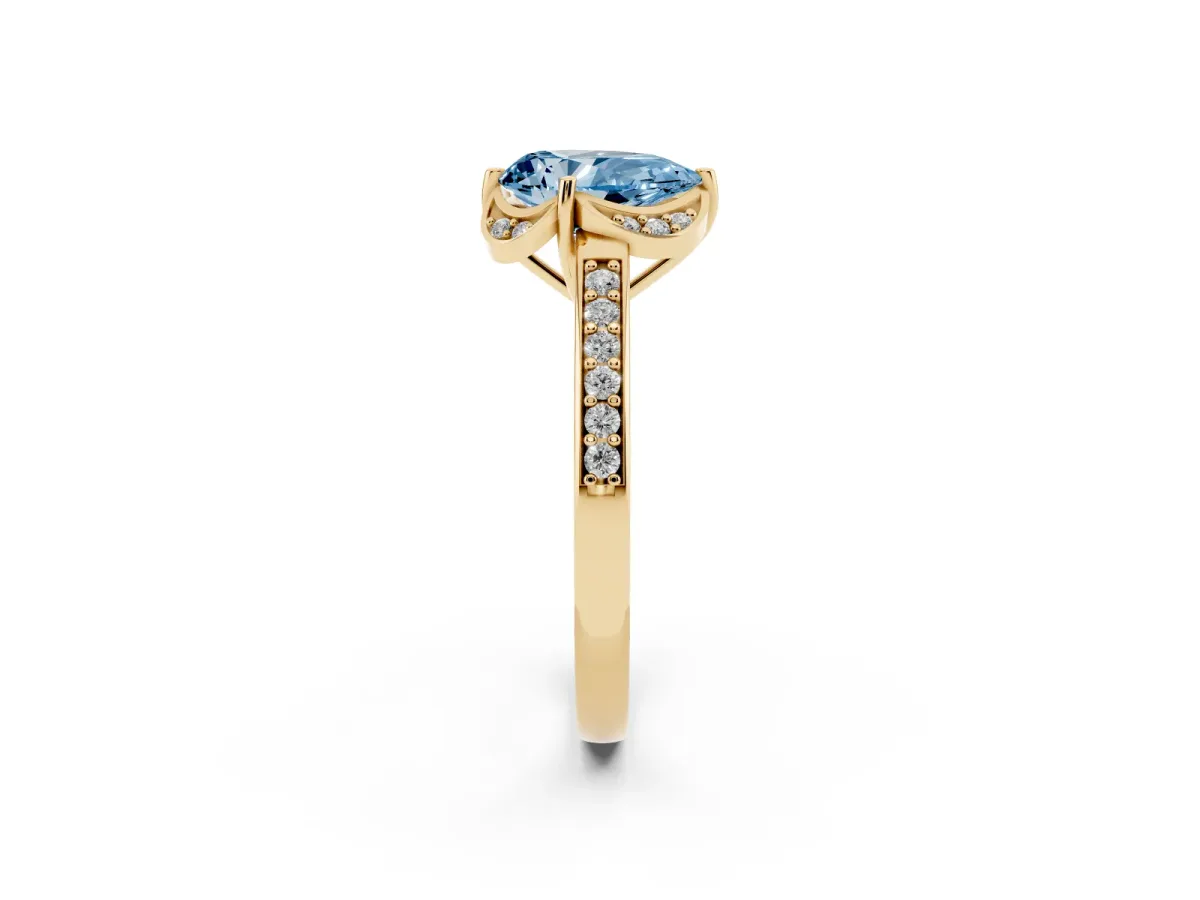 Fancy Blue Pear Cut Cut Halo Diamond Ring with Channel Set Band and Four-Prong Setting Yellow gold