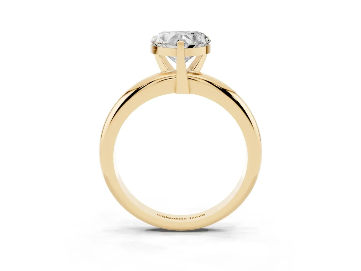 Heart Cut Diamond Solitaire Engagement Ring with Round Band and Four-Prong Setting Yellow gold
