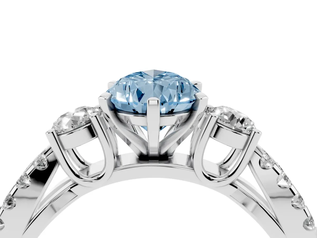 Fancy Blue Pear Cut Diamond Three-Stone Ring with Pavé Split Shank and Four-Prong Setting Silver
