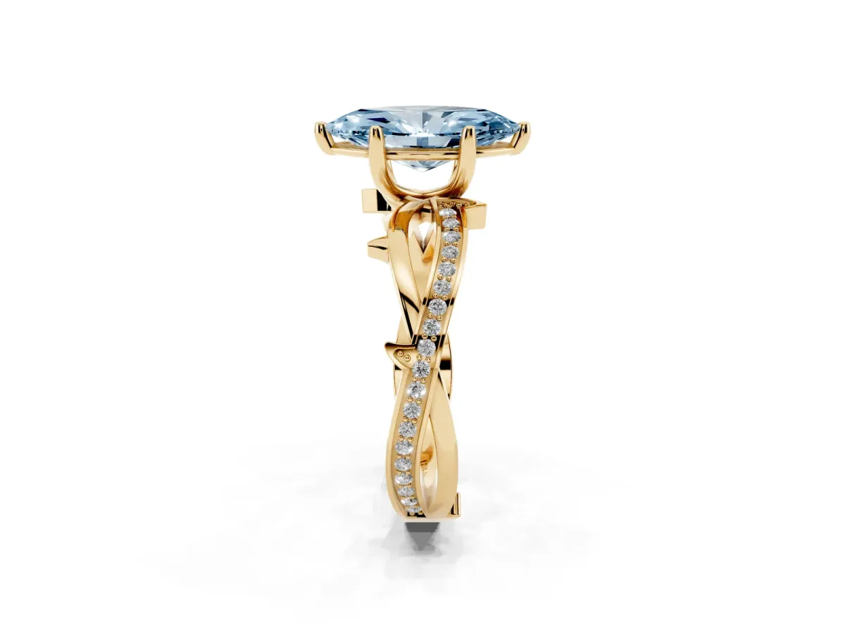 Fancy Blue Marquise Cut Solitaire Twist Band with Pavé Accents and Four-Prong Setting Yellow gold