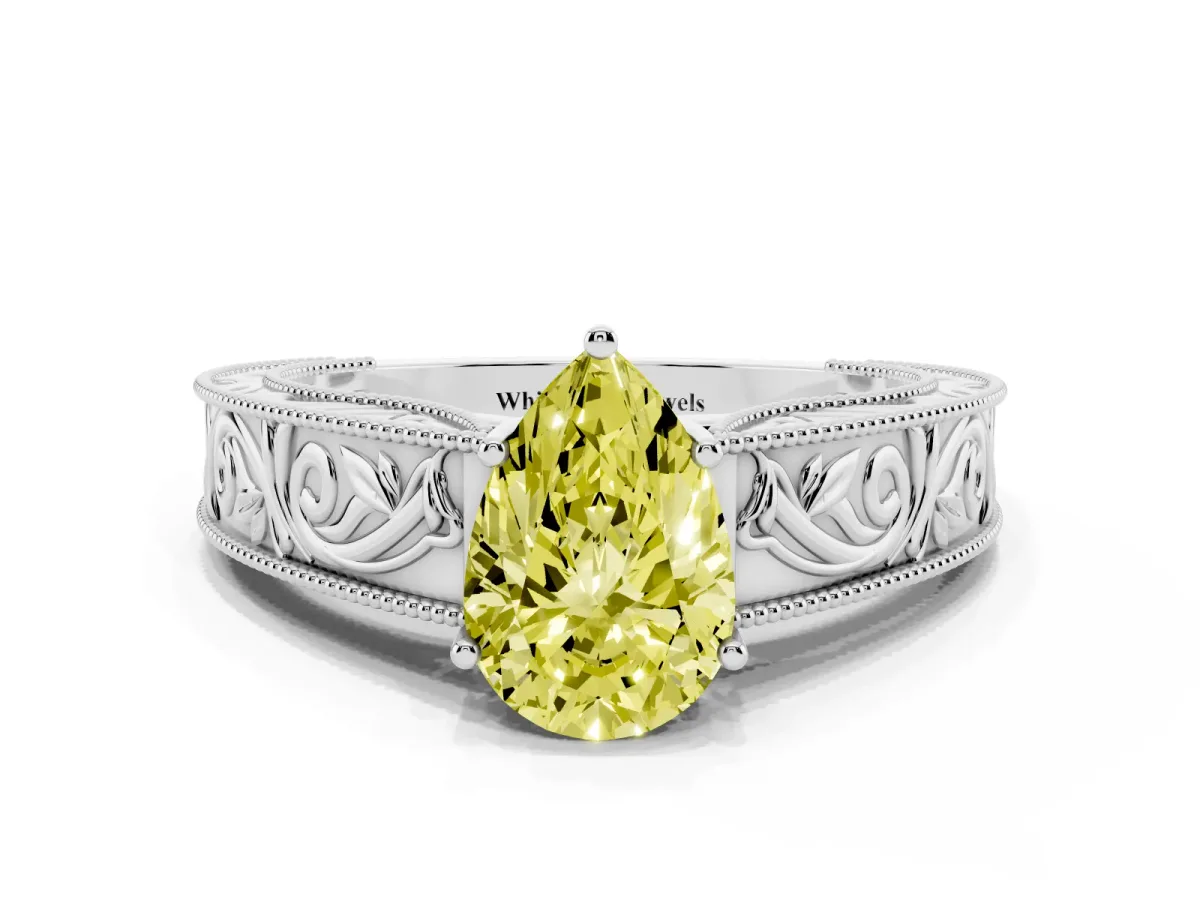 Fancy Yellow Pear Cut Diamond Solitaire Ring with Engraved Band and Four-Prong Setting Silver