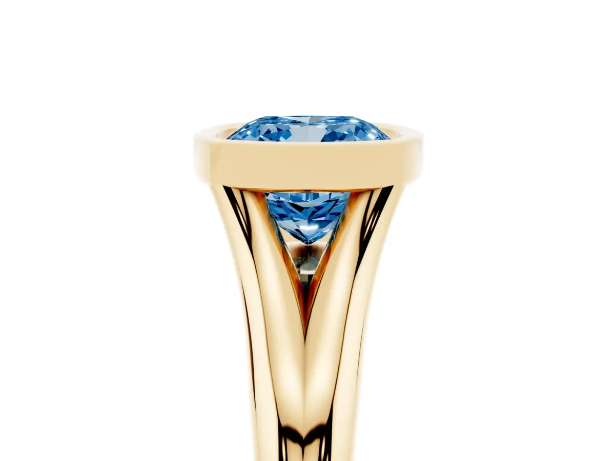 Fancy Blue Bezel Set Cushion Cut Solitaire Diamond Ring with Smooth Band Yellow gold