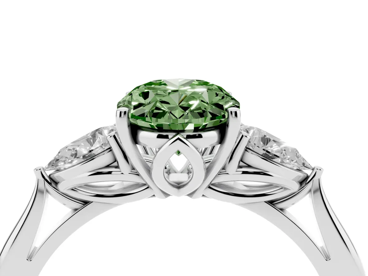 Fancy Green Three-Stone Oval Cut Diamond Ring with Pear Side Stones in Four-Prong Setting Platinum