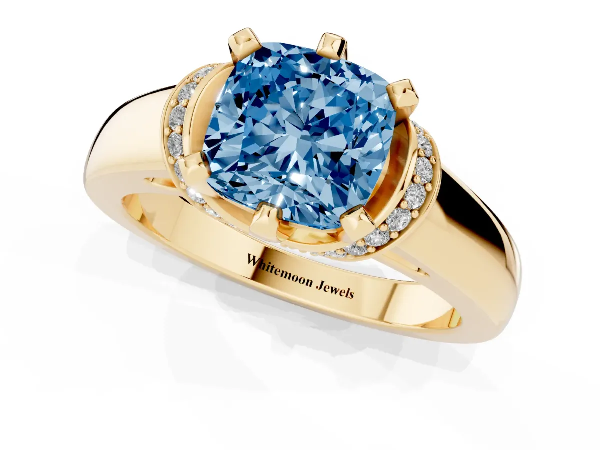 Fancy Blue Cushion Cut Solitaire Diamond Ring with Pave Band and Six-Prong Setting Yellow gold