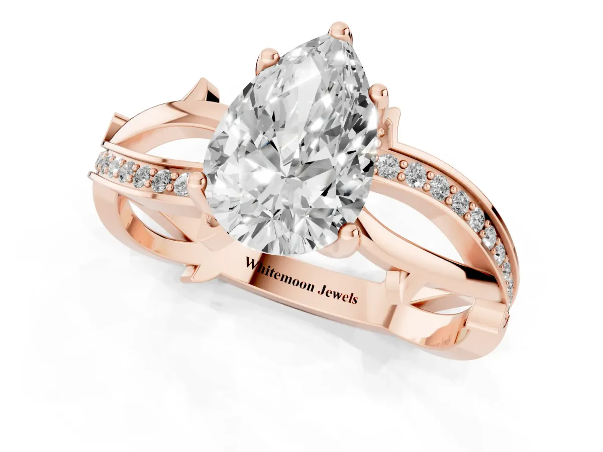 Pear Cut Solitaire Twist Band with Pavé Accents and Four-Prong Setting Rose gold