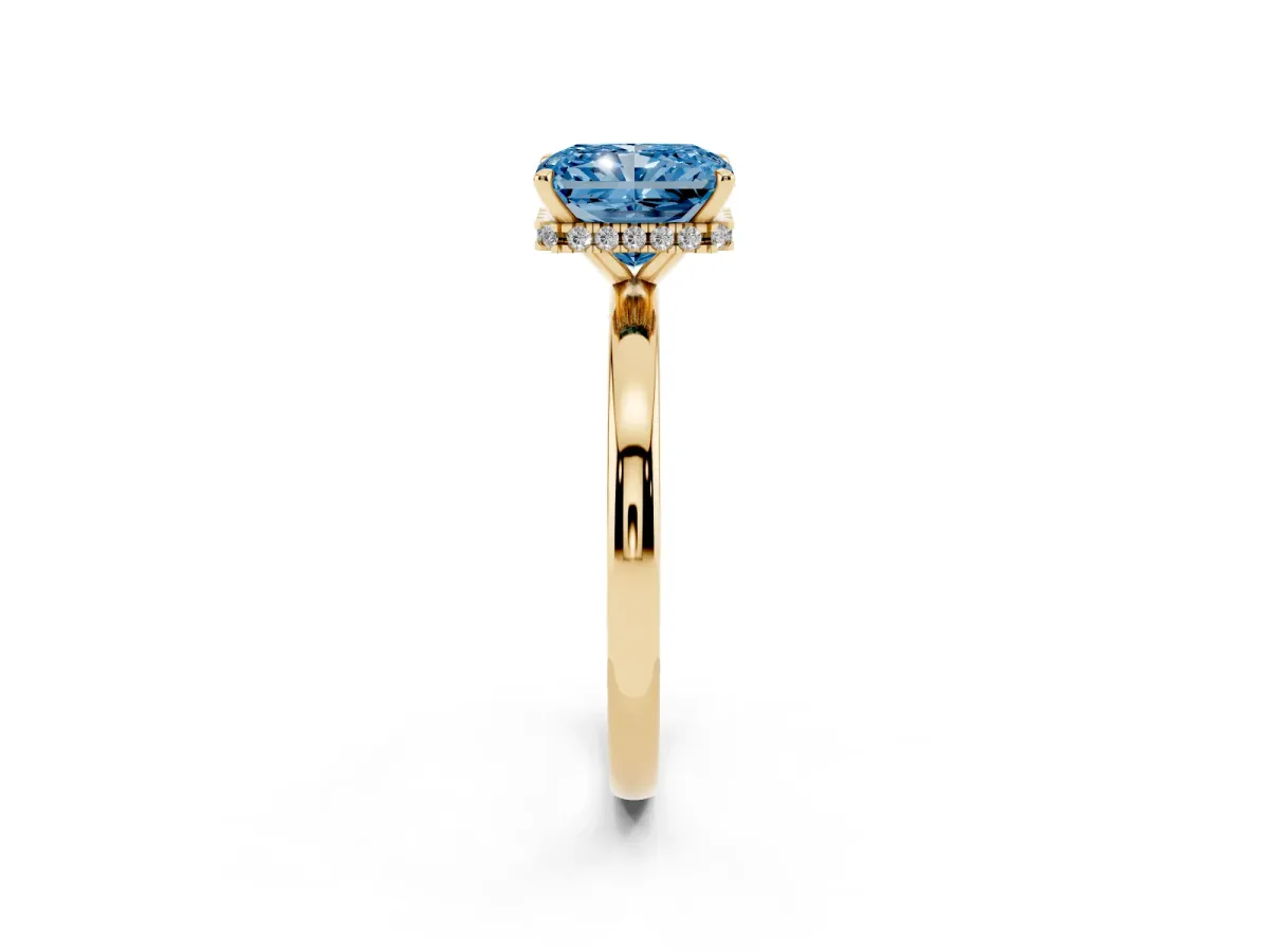 Fancy Blue Radiant Cut Solitaire Engagement Ring with Cathedral Band and Four-Prong Setting Yellow gold