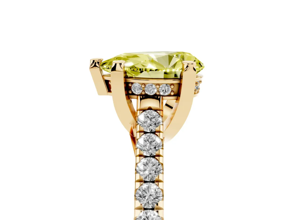 Fancy Yellow Pear Cut Brilliant Diamond Solitaire with Pavé Band and Four-Prong Setting Yellow gold