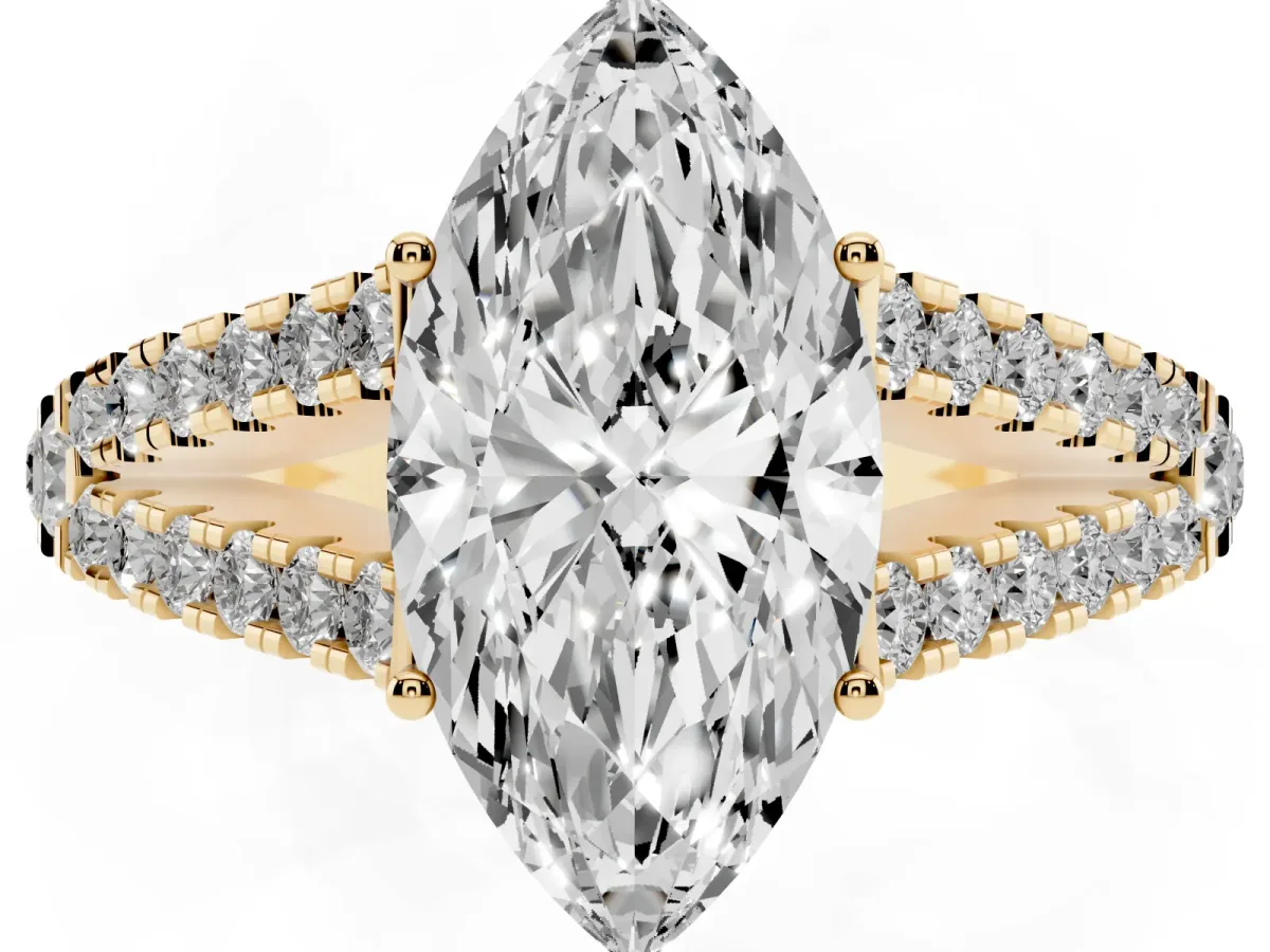 Marquise Cut Diamond Split Shank Engagement Ring with Round Pavé and Prong Setting Yellow gold