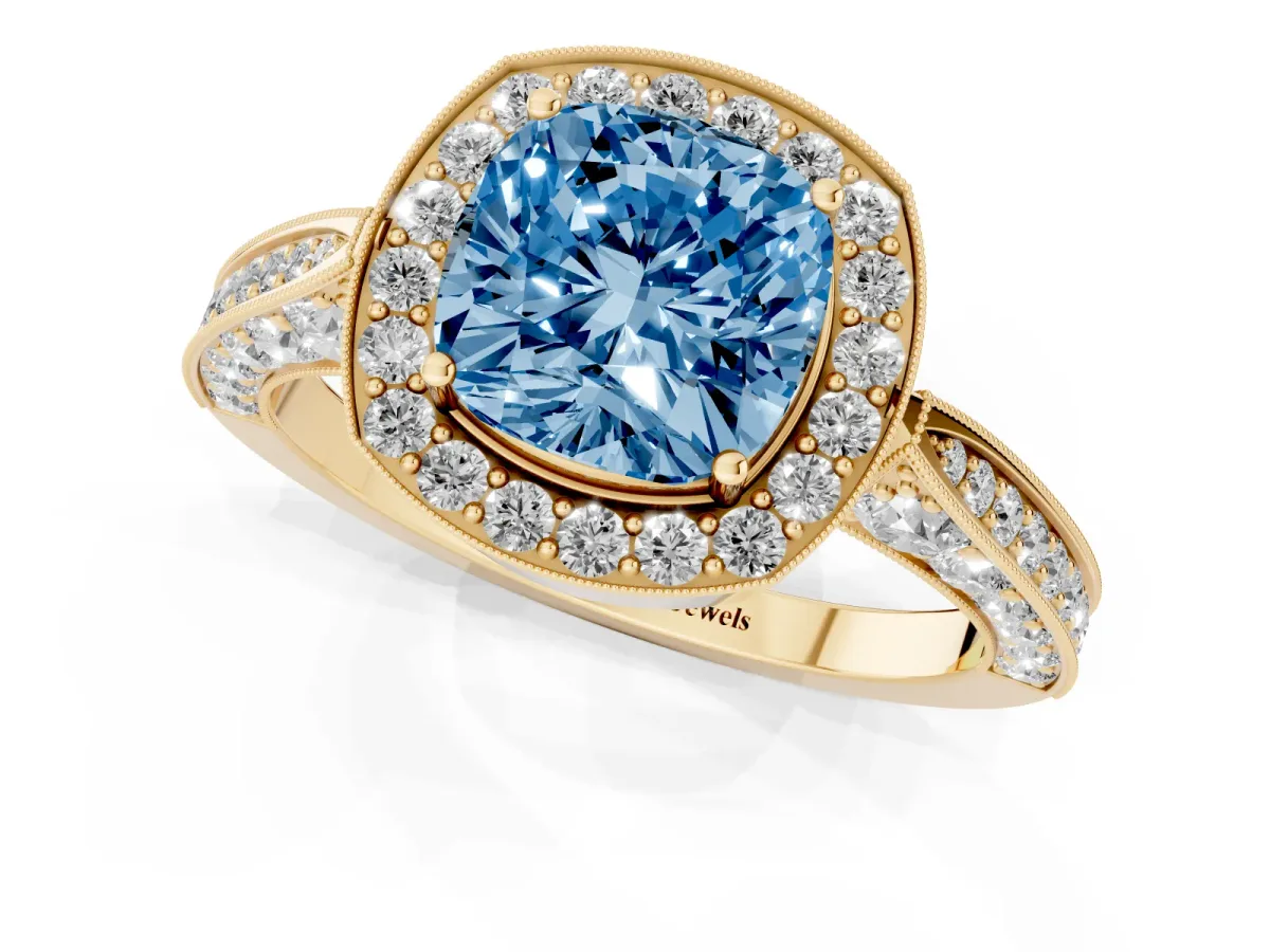 Fancy Blue Cushion Cut Halo Diamond Engagement Ring with Split Shank Band and Four-Prong Setting Yellow gold
